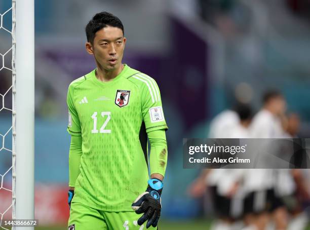 Shuichi Gonda of Japan reacts after conceding a penalty to Ilkay Guendogan of Germany during the FIFA World Cup Qatar 2022 Group E match between...