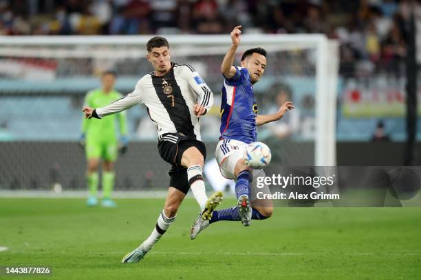 Kai Havertz of Germany battles for possession with Maya Yoshida of Japan during the FIFA World Cup Qatar 2022 Group E match between Germany and Japan...