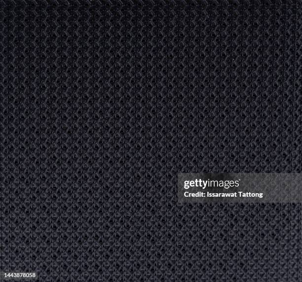 macrotexture of textile material or coarse fabric close-up with symmetric and identical mesh plexus for abstract empty background or for single-tone wallpaper - white shirt texture stock pictures, royalty-free photos & images