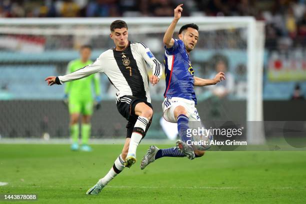 Kai Havertz of Germany battles for possession with Maya Yoshida of Japan during the FIFA World Cup Qatar 2022 Group E match between Germany and Japan...