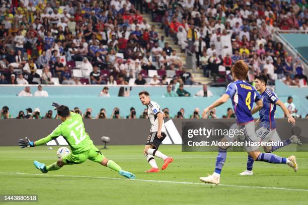 Shuichi Gonda of Japan makes a save against Jonas Hofmann of Germany during the FIFA World Cup Qatar 2022 Group E match between Germany and Japan at...