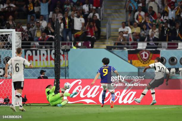 Shuichi Gonda of Japan makes a save against Serge Gnabry of Germany during the FIFA World Cup Qatar 2022 Group E match between Germany and Japan at...