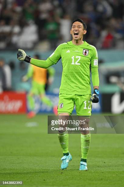Shuichi Gonda of Japan celebrates his side's first goal scored by Ritsu Doan during the FIFA World Cup Qatar 2022 Group E match between Germany and...