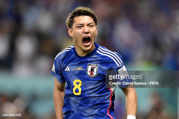 Ritsu Doan of Japan celebrates after scoring their team's first goal during the FIFA World Cup Qatar 2022 Group E match between Germany and Japan at...