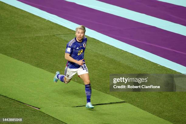 Takuma Asano of Japan celebrates scoring their second goal during the FIFA World Cup Qatar 2022 Group E match between Germany and Japan at Khalifa...