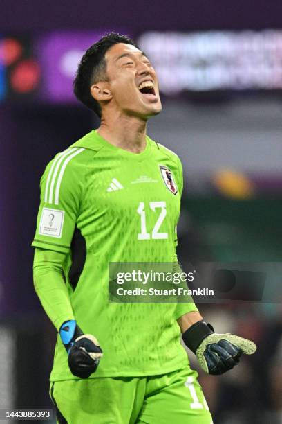 Shuichi Gonda of Japan celebrates their team's second goal by Takuma Asano during the FIFA World Cup Qatar 2022 Group E match between Germany and...