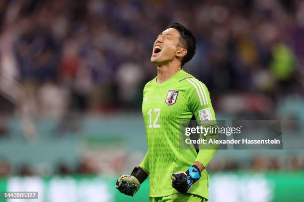 Shuichi Gonda of Japan celebrates their team's second goal by Takuma Asano during the FIFA World Cup Qatar 2022 Group E match between Germany and...