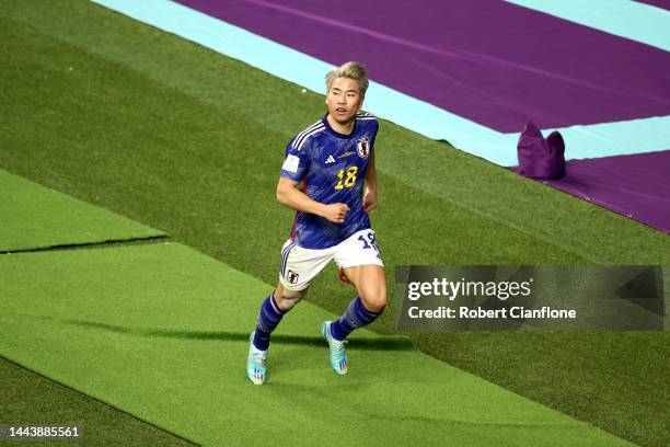 Takuma Asano of Japan celebrates scoring their second goal during the FIFA World Cup Qatar 2022 Group E match between Germany and Japan at Khalifa...