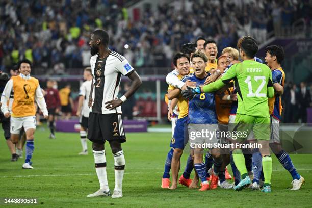 Japan players celebrate the 2-1 win during the FIFA World Cup Qatar 2022 Group E match between Germany and Japan at Khalifa International Stadium on...