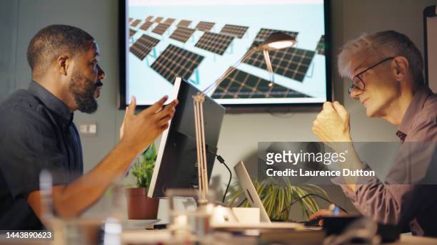 office chat solar panel - economic discussion stock pictures, royalty-free photos & images
