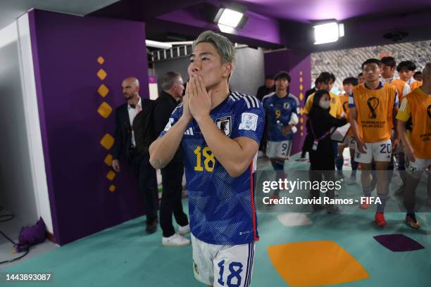 Takuma Asano of Japan walks off the pitch after the 2-1 win during the FIFA World Cup Qatar 2022 Group E match between Germany and Japan at Khalifa...