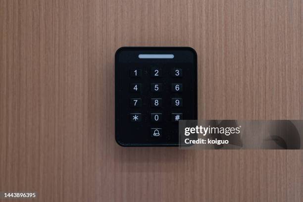 physical password entry panel on the wall - push button combination lock stock pictures, royalty-free photos & images