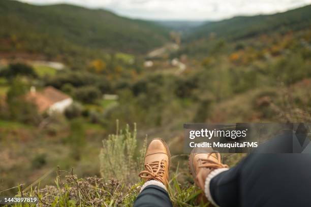 point of view of tourist contemplating view of mountains - alentejo stockfoto's en -beelden