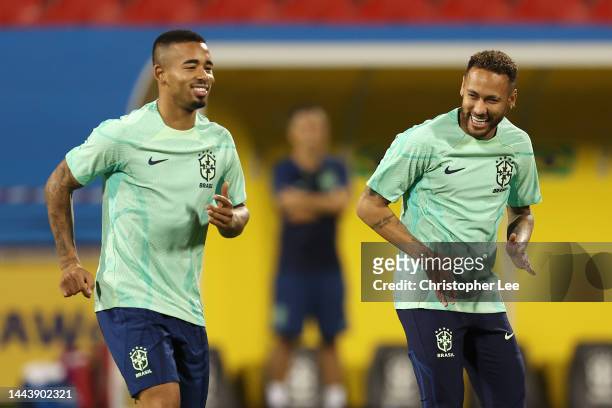 Gabriel Jesus and Neymar of Brazil react during Brazil match day -1 training session at Al Arabi SC Stadium on November 23, 2022 in Doha, Qatar.