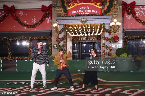 Flula Borg, Adam Devine, and Sarah Hyland perform during the second day of Macy's Thanksgiving Day Parade rehearsals at Macy's Herald Square on...