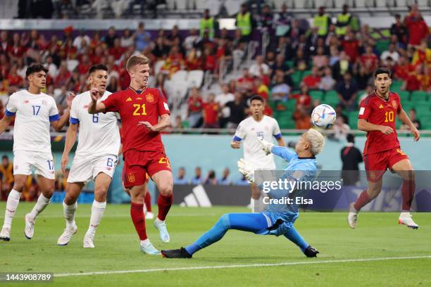 Dani Olmo of Spain scores their team's first goal past Keylor Navas of Costa Rica during the FIFA World Cup Qatar 2022 Group E match between Spain...