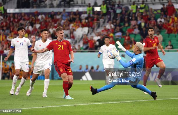 Dani Olmo of Spain scores their team's first goal past Keylor Navas of Costa Rica during the FIFA World Cup Qatar 2022 Group E match between Spain...