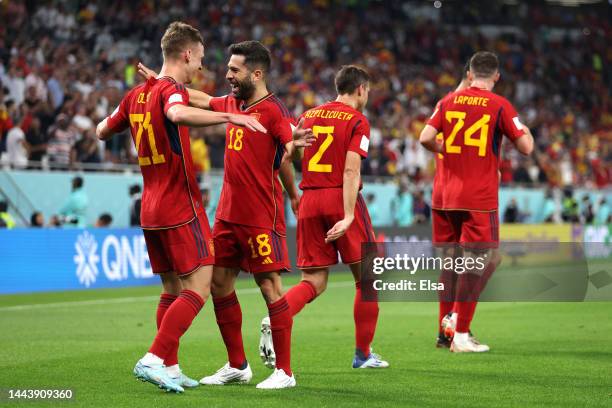 Dani Olmo of Spain celebrates with Jordi Alba after scoring their team's first goal during the FIFA World Cup Qatar 2022 Group E match between Spain...