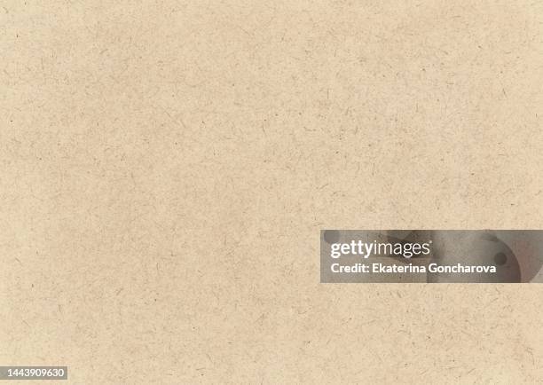 textured background made of brown paper or cardboard for design and decoration - sfondo beige foto e immagini stock