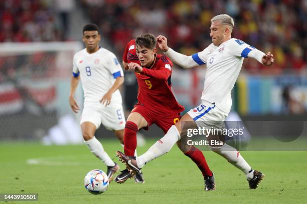 Gavi of Spain battles for possession with Francisco Calvo of Costa Rica during the FIFA World Cup Qatar 2022 Group E match between Spain and Costa...