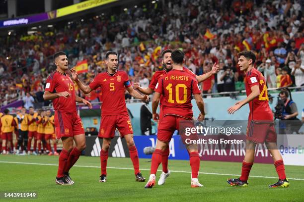 Marco Asensio of Spain celebrates with teammates after scoring their team's second goal during the FIFA World Cup Qatar 2022 Group E match between...