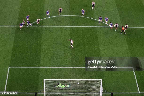 Ilkay Guendogan of Germany scores their team's first goal via a penalty past Shuichi Gonda of Japan during the FIFA World Cup Qatar 2022 Group E...