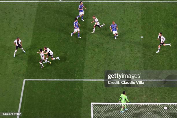 Ilkay Guendogan of Germany celebrates after scoring their team's first goal via a penalty past Shuichi Gonda of Japan during the FIFA World Cup Qatar...