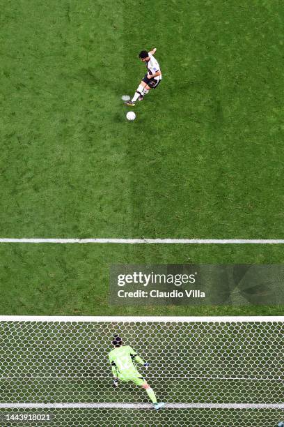 Ilkay Guendogan of Germany scores their team's first goal via a penalty past Shuichi Gonda of Japan during the FIFA World Cup Qatar 2022 Group E...