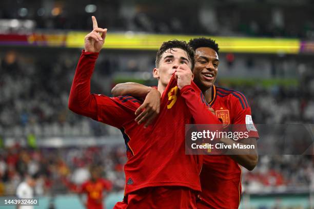 Gavi of Spain celebrates with Alejandro Balde after scoring their team's fifth goal during the FIFA World Cup Qatar 2022 Group E match between Spain...