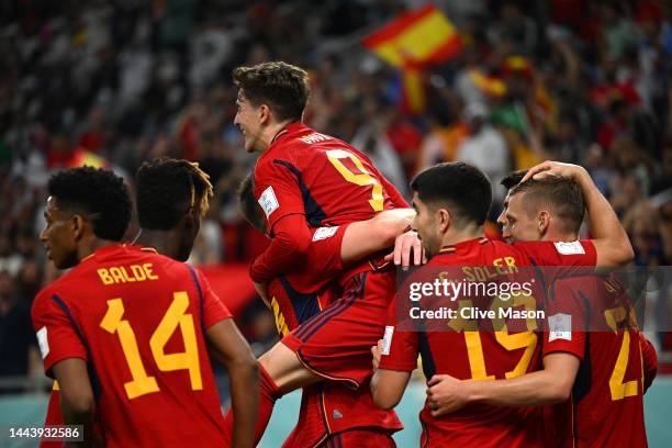 Gavi of Spain celebrates with teammates after scoring their team's fifth goal during the FIFA World Cup Qatar 2022 Group E match between Spain and...