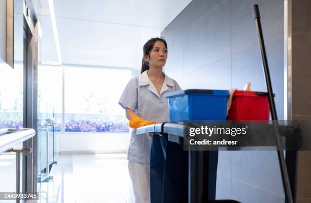 professional cleaner working at a hospital - hospital cart stock pictures, royalty-free photos & images