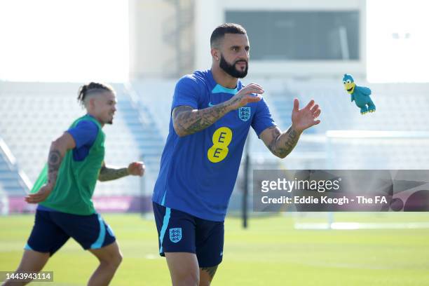 Kyle Walker of England throws a rubber toy during a training session at Al Wakrah Stadium on November 23, 2022 in Doha, Qatar.