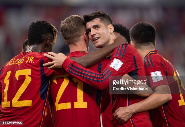 Alvaro Morata of Spain celebrates scoring the seventh goal with team mates Nico Williams, Dani Olmo and Carlos Soler during the FIFA World Cup Qatar...