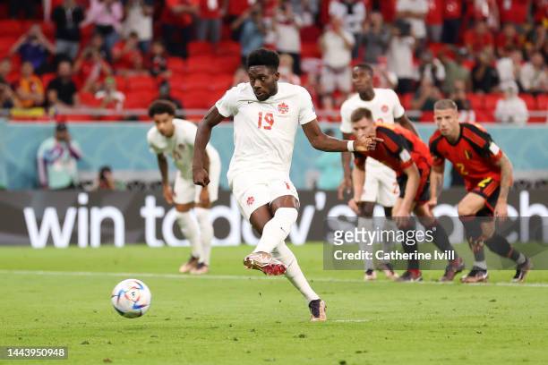 Alphonso Davies of Canada takes a penalty during the FIFA World Cup Qatar 2022 Group F match between Belgium and Canada at Ahmad Bin Ali Stadium on...