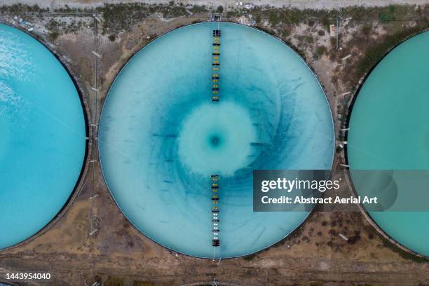drone image looking down on a water treatment facility, vietnam - fábrica de dessalinização imagens e fotografias de stock