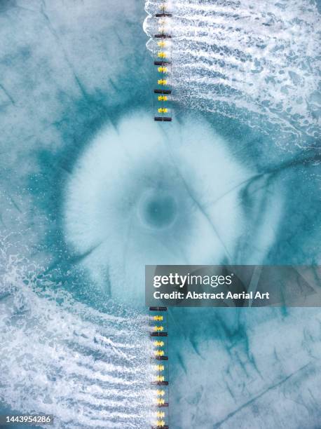 overhead view showing a sprinkler system in a water treatment tank, vietnam - wasser industrie stock-fotos und bilder