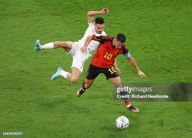 Eden Hazard of Belgium controls the ball against Stephen Eustaquio of Canada during the FIFA World Cup Qatar 2022 Group F match between Belgium and...