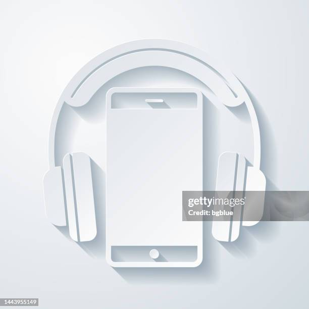 headphones with smartphone. icon with paper cut effect on blank background - wireless headphones white background stock illustrations