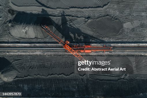 Aerial image directly above an industrial machine working in a coal pit, Vietnam