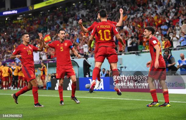 Marco Asensio of Spain celebrates with team mates after scoring during the FIFA World Cup Qatar 2022 Group E match between Spain and Costa Rica at Al...