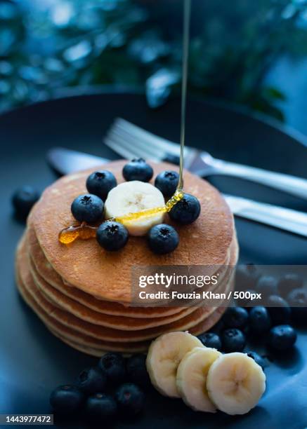 close-up of fruits in plate on table - maple syrup stock pictures, royalty-free photos & images