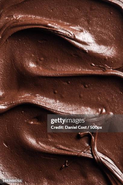 full frame shot of chocolate on brown background - chocolat photos et images de collection