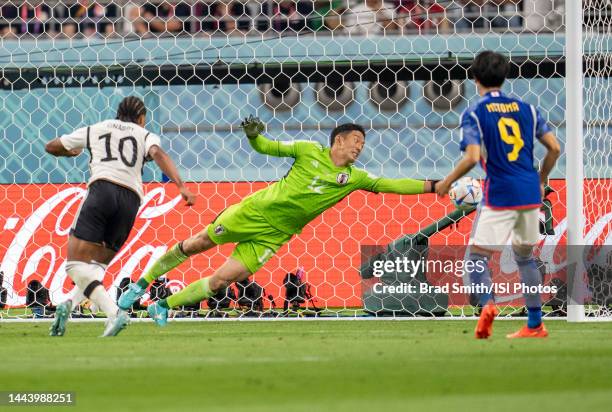 Serge Gnabry of Germany has his shot saved by Shuichi Gonda of Japan during a FIFA World Cup Qatar 2022 Group E match between Japan and Germany at...