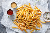 French fries with ketchup and cocktail sauce