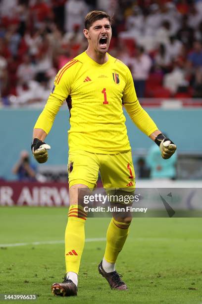 Thibaut Courtois of Belgium celebrates saving the penalty taken by Alphonso Davies of Canada during the FIFA World Cup Qatar 2022 Group F match...