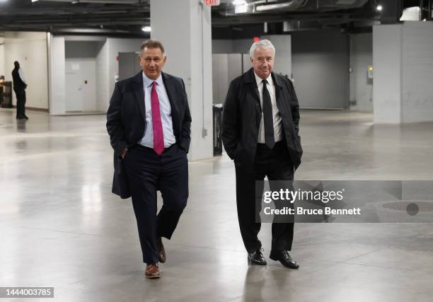 General Manager Ken Holland and Chairman Bob Nicholson of the Edmonton Oilers arrive for the game against the New York Islanders at the UBS Arena on...