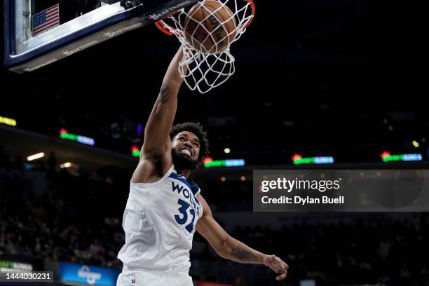 Karl-Anthony Towns of the Minnesota Timberwolves dunks the ball in the third quarter against the Indiana Pacers at Gainbridge Fieldhouse on November...