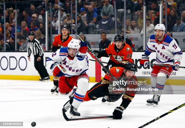 Julien Gauthier of the New York Rangers skates for the puck against John Klingberg of the Anaheim Ducks in the first period at Honda Center on...