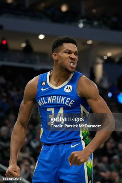 Giannis Antetokounmpo of the Milwaukee Bucks celebrates after scoring a basket against the Chicago Bulls during the second half at Fiserv Forum on...