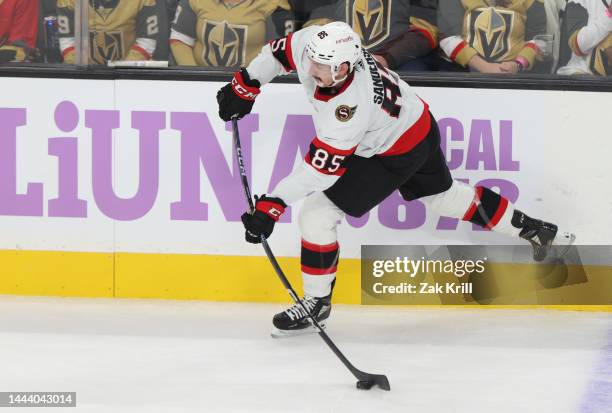 Jake Sanderson of the Ottawa Senators shoots the puck during the first period against the Vegas Golden Knights at T-Mobile Arena on November 23, 2022...